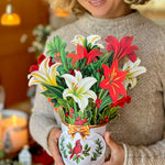 Winter Joy bouquet of lilies and holly