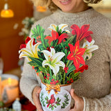 Winter Joy bouquet of lilies and holly