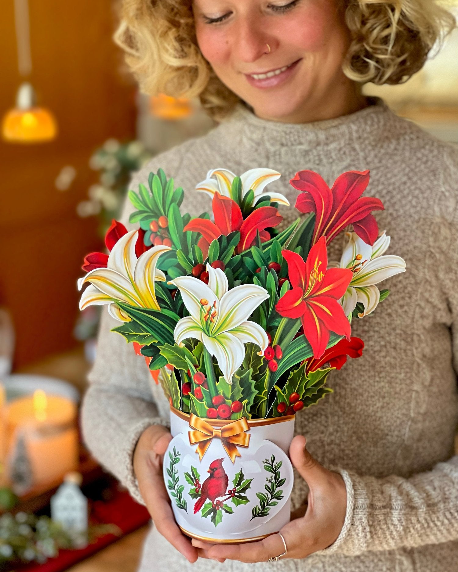 Winter Joy bouquet of lilies and holly