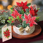 FreshCut Paper Birch Poinsettia centerpiece